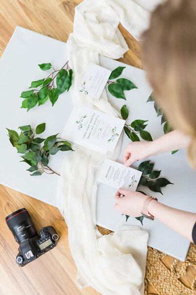 Flat lay of wedding stationery