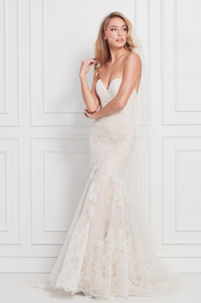 Femininity at its most delicate, Locklin exemplifies bridal elegance. A bodice with a Samira Embroidered Motif shimmers with every movement, and the flowing Soft Netting skirt is a dream come true. Sweep train.