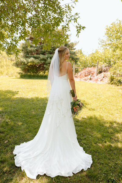 bride poses for bridal portraits in kansas city missouri