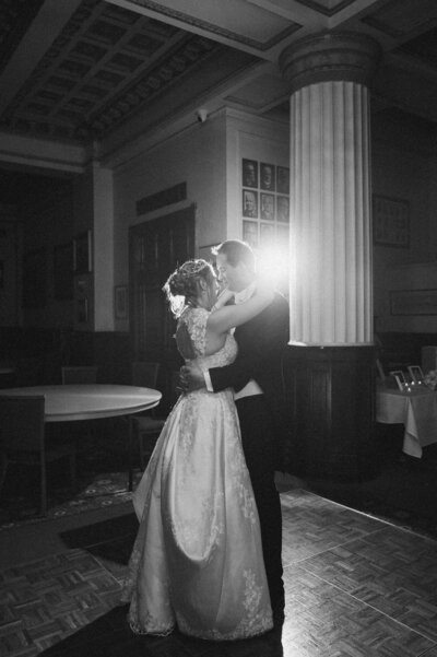 Bride and groom cutting their wedding cake during a Blue Mountains reception