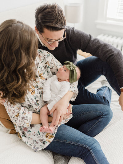 parents holding newborn