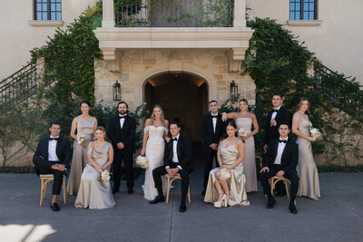Lat night flat lay with cake, flower bouquet, cake cutting utensils, wedding favors during reception at Tuscan Rose Ranch in Santa Paula California 