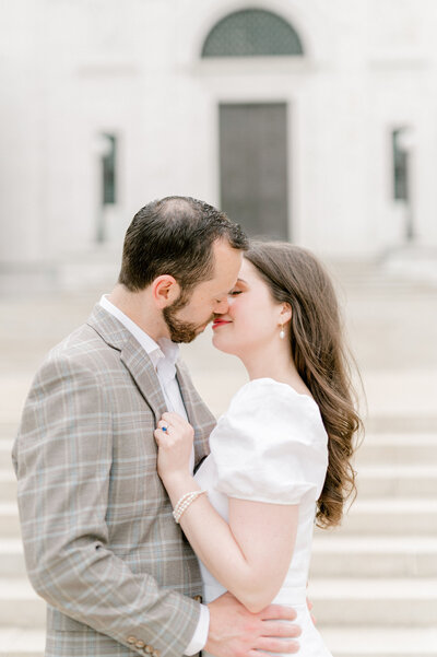 Couple kissing during their engagement photos by Rachael Mattio Photography
