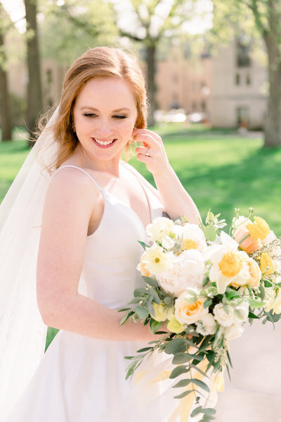 bride with wedding flowers bouquet in Indiana