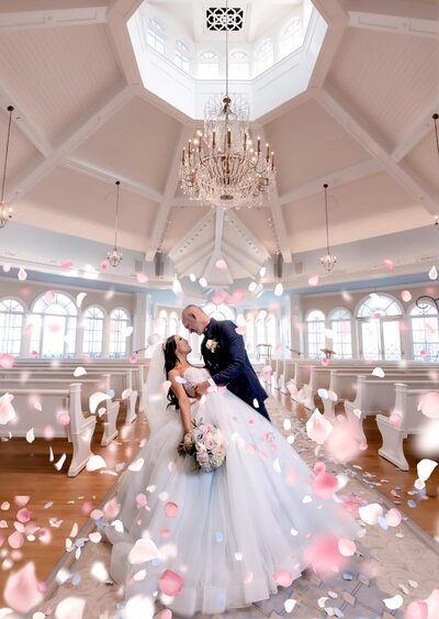 Bride and groom first kiss Orlando wedding photographer Bella Grey