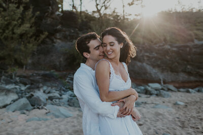 couple embracing in the ocean