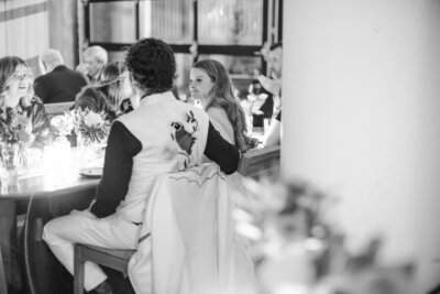 couple walking hand in hand at clementine hall wedding nashville wedding venue