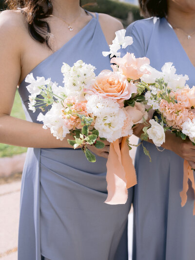 Bridesmaid Holding Wedding Bouquet of Flowers