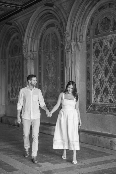 Groom holding bride