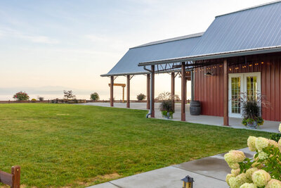 The red rustic and modern barn located at the wedding and event venue.