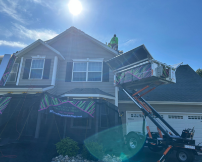 view of Catch-All protecting the property and Equipter raised to the roof for debris to be collected in