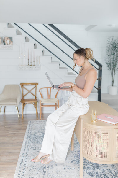 Lancaster wedding planner assisting bride with the bottom of her dress