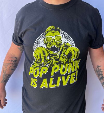 Man wearing black custom pop punk is alive tshirt