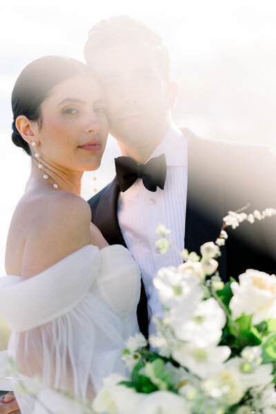 Light filled bride and groom portrait at New Jersey beach wedding