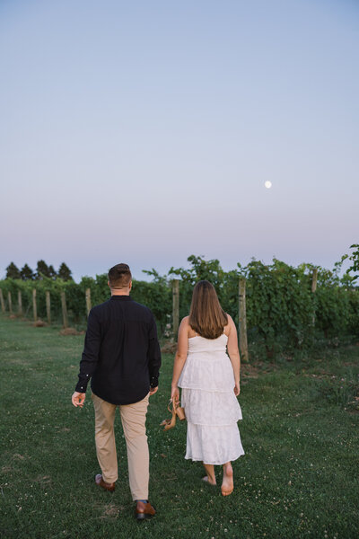 Bride walking down the aisle with father at forest wedding in Finger Lakes, New York