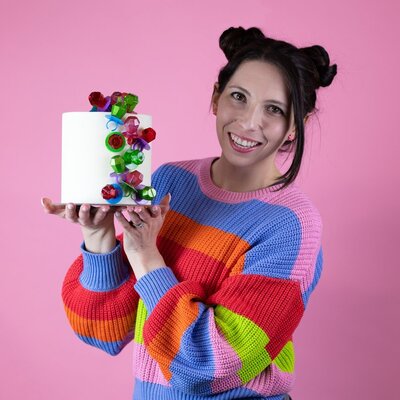 Sheri Wilson holding cake
