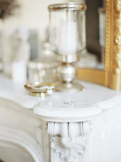 A close up of bride and grooms wedding bands