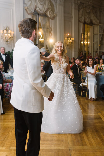 Bride and groom first dance at Rosecliff Mansion
