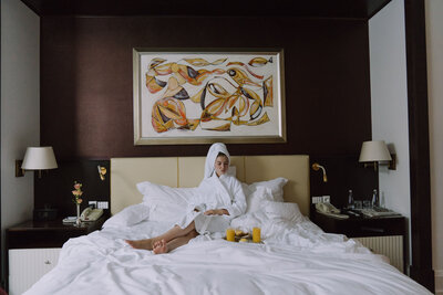 A women enjoying room service