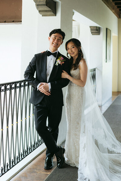 19-radiant-love-events-bride-groom-holding-hands-walking-away-bride-looking-back-outdoor-ranch-backdrop-romantic-elegant-timeless