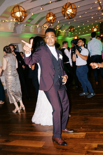 Wedding guests lifted during hora at Glen Foerd Estate in Philadelphia, PA