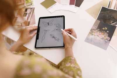 brand designer creating illustrations on an ipad
