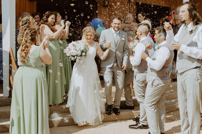 newlyweds send off with bubbles