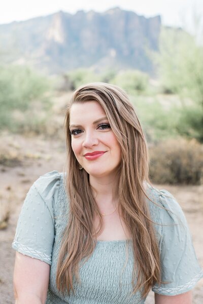 photographer jilian kline posing for a branding session in lost dutchman state park in mesa az