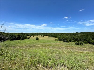 Wide-angle photo of rural land for sale with 360-degree views in North Texas