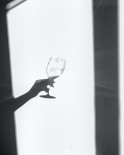 woman holding wine glass