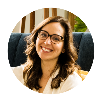 Professional headshot of Melonie, owner of Grassroots Creative Co., a web design and branding studio for health and wellness professionals.