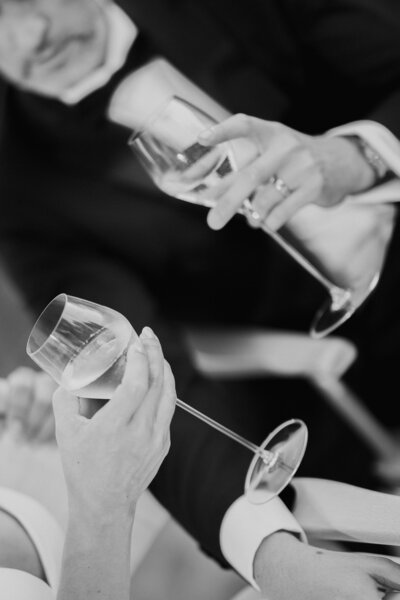 Couple toasting champagne on their wedding day.