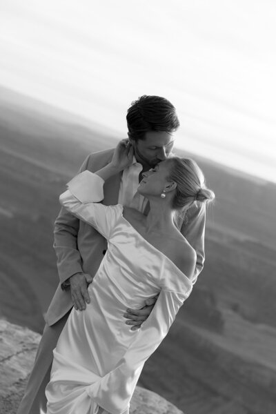 Photo of luxury, adventure elopement in southern Utah in Dead Horse Point State Park. Beautiful bride and groom captured in an editorial way.