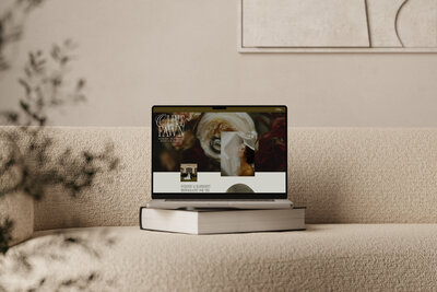 A website mockup showcasing a custom web design for a female luxury wedding photographer