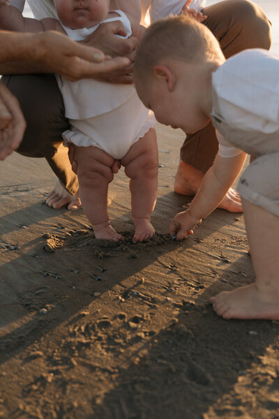 family on sand