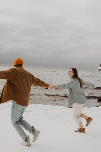 Destination engagement session on Black Beach in Silver Bay North Shore, Minnesota