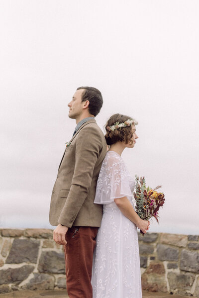 Couple standing together during their mountaintop elopement in Virginia, captured by Editorial Wedding Co.
