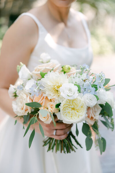 Leigh Florist Design Studio Vintage white peach and blue bridal bouquet