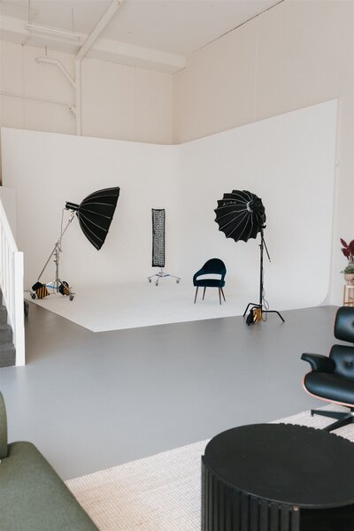 Bright interior of Studio by Pepper June with cyclorama and seating in Castle Hill, Sydney