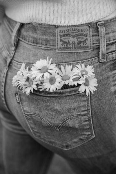 Photo of flowers in back pocket of jeans | Senior Session