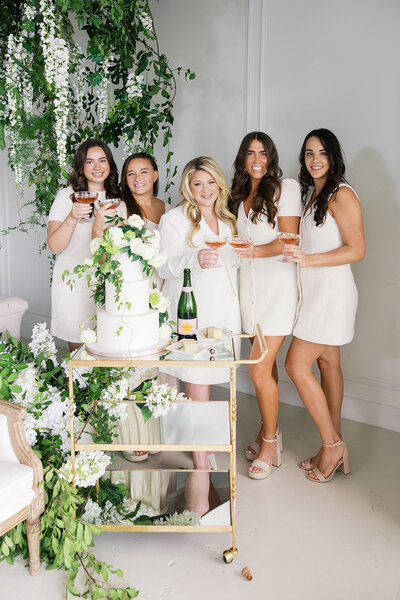four women smiling