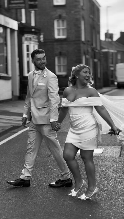 Bride and groom smiling with other