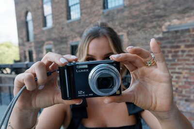A couple with their arms around each other about to kiss