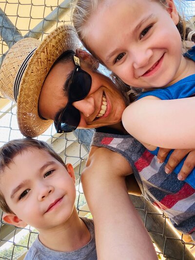 Marcia Hanging out her niece and nephew at a sporting event. 