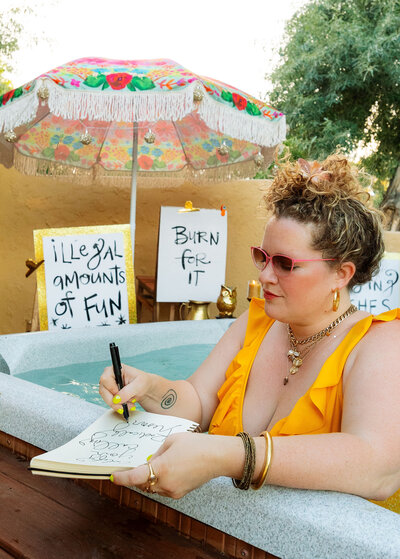 Oracle Business Witch Rachael Maddox teaches business magick and money magick, guiding entrepreneurs to release hustle energy and fund their world-changing visions.
