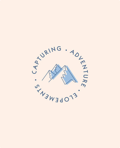 Round badge with an icon of a mountain in the middle and the tagline for Wander Weddings: Capturing Adventure Elopements.