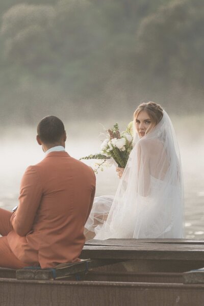 bride and groom share a look after their charlotte ceremony