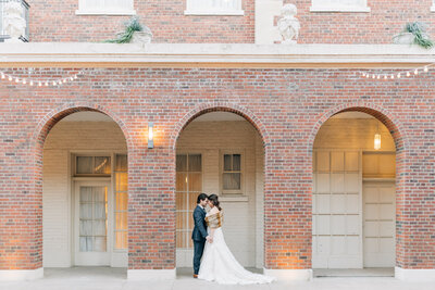 Bride and Groom share a first dance at the Omaha Ne Wedding Venue, The Omar. Photo by Omaha NE Wedding Photographer, Anna Brace