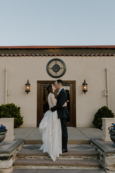 bride and groom kissing