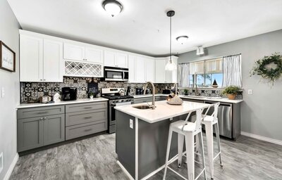 Gourmet kitchen with island in this 3-bedroom, 2.5 bathroom lake house with incredible view of Lake Belton located at Morgan's Point, near Rogers Park and Temple Lake Park.